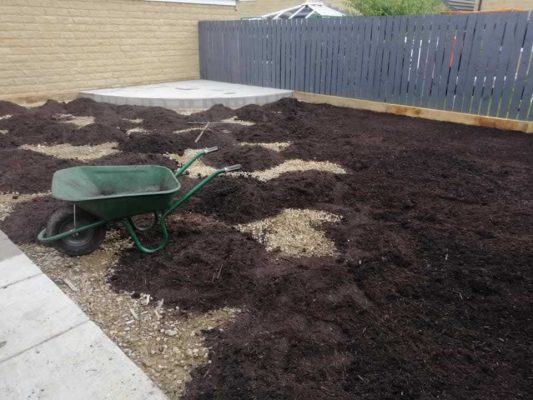 Ground leveled and topsoil being applied